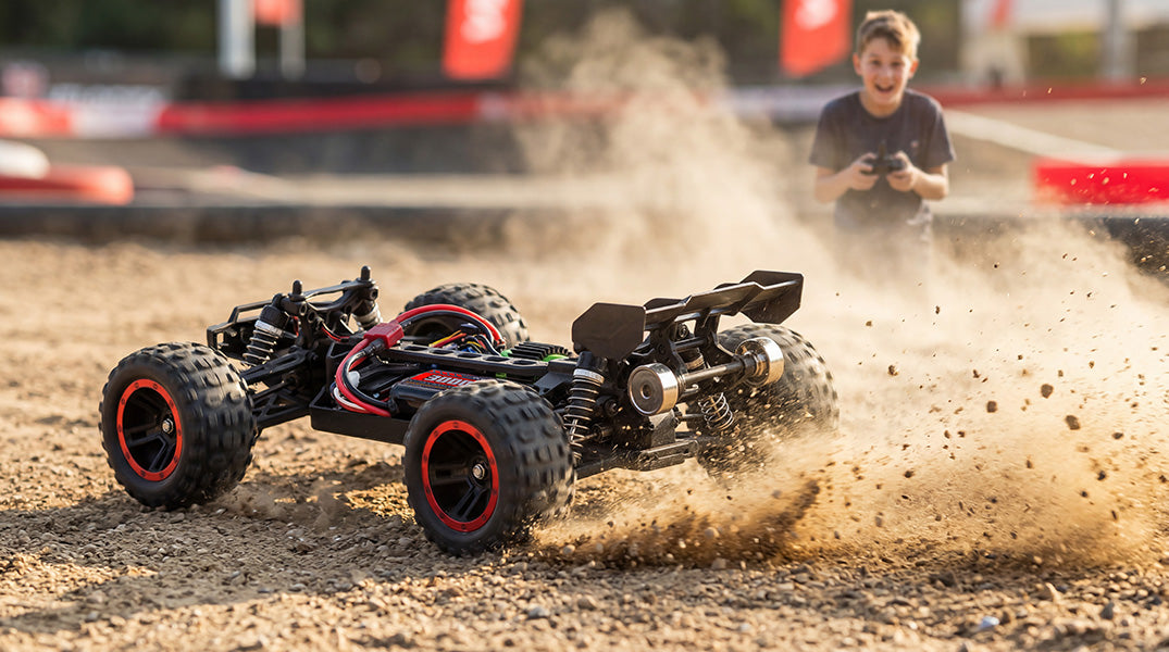 Child driving 1/10 scale RC short course truck on gravel track, powered by 7.4V 3000mAh RC battery, outdoor racing with dust flying